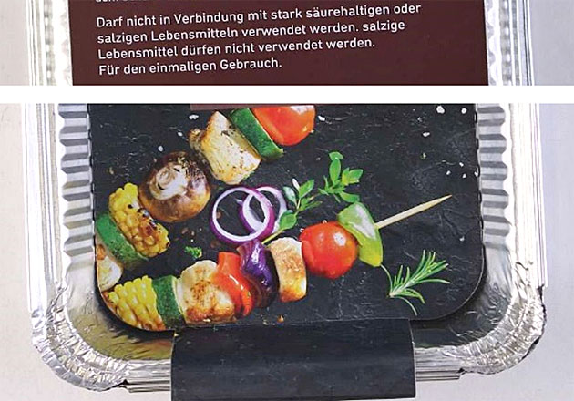 Foto einer Probenverpackung mit dem Verwendungshinweis bez�glich stark s�urehaltigen Lebensmitteln sowie einem Bild von Spie�en mit Tomaten.