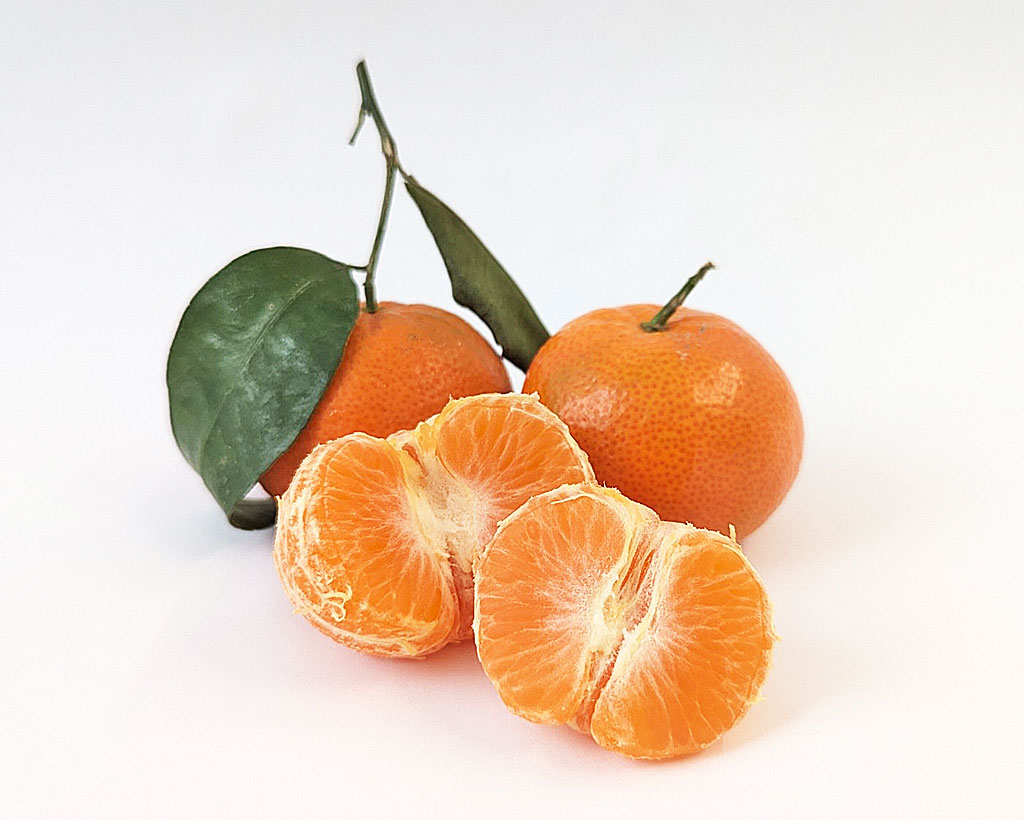 Mandarinen mit und ohne Schale.